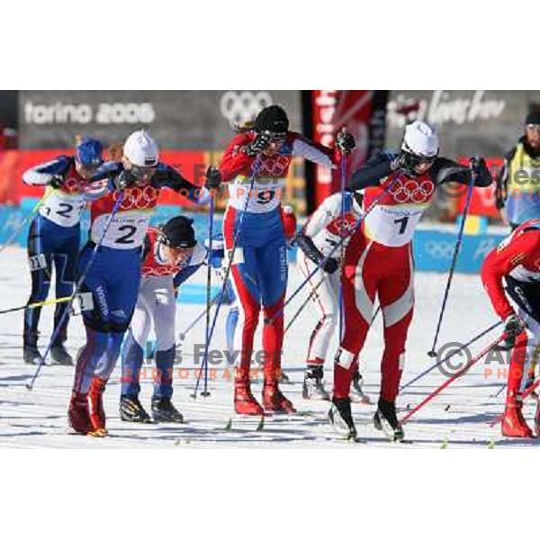 Kristina Smigun, Olympig gold medalist in Cross-country Women\'s 15km Pursuit (7.5km+7.5km) and Petra Majdic during Torino 2006 Winter Olympic Games in Pragelato Plan, Italy on February 12, 2006