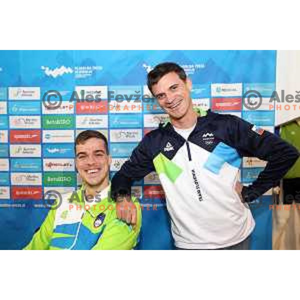 Peter John Stevens and Luka Berdajs, coach of Slovenia Swimming team at press conference in Ljubljana, Slovenia on November 28, 2022 