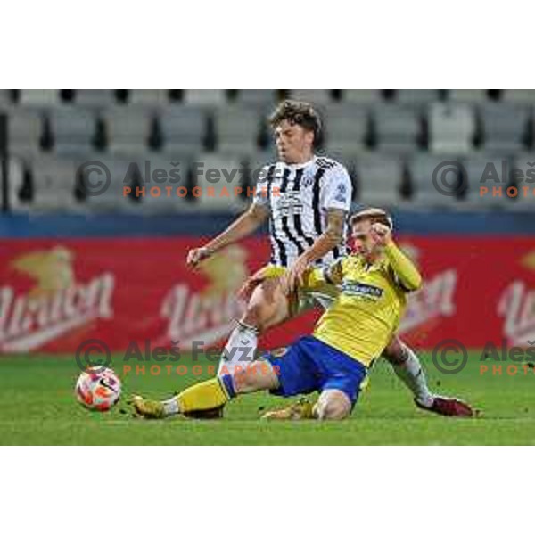 Kai Cipot and Rudi Pozeg Vancas in action during Prva Liga Telemach 2022-2023 football match between Koper and Mura at Bonifika Arena in Koper, Slovenia on November 30, 2022