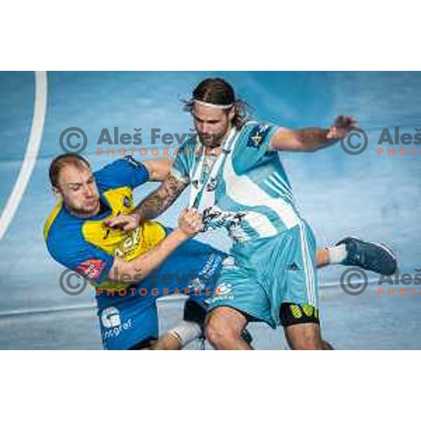 Ziga Mlakar and Dean Bombac in action during EHF Champions League handball match between RK Celje Pivovarna Lasko and Pick Szeged in Dvorana Zlatorog, Celje, Slovenia on November 30, 2022. Photo: Jure Banfi