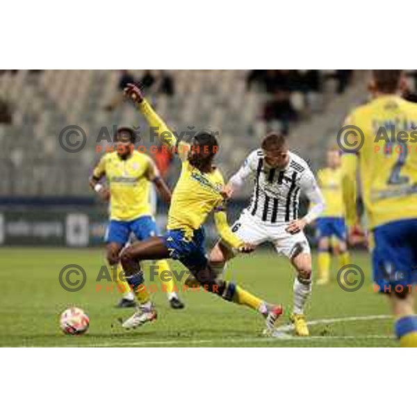 Omar Correia and Amar Beganovic in action during Prva Liga Telemach 2022-2023 football match between Koper and Mura at Bonifika Arena in Koper, Slovenia on November 30, 2022