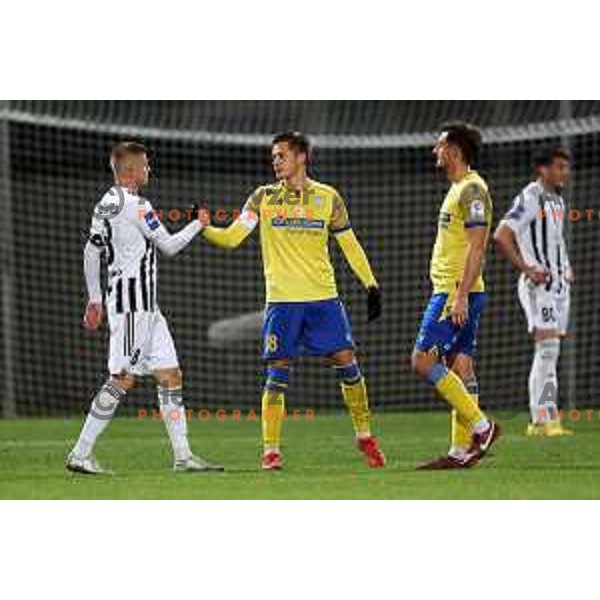 Luka Bobicanec and Matej Palcic in action during Prva Liga Telemach 2022-2023 football match between Koper and Mura at Bonifika Arena in Koper, Slovenia on November 30, 2022