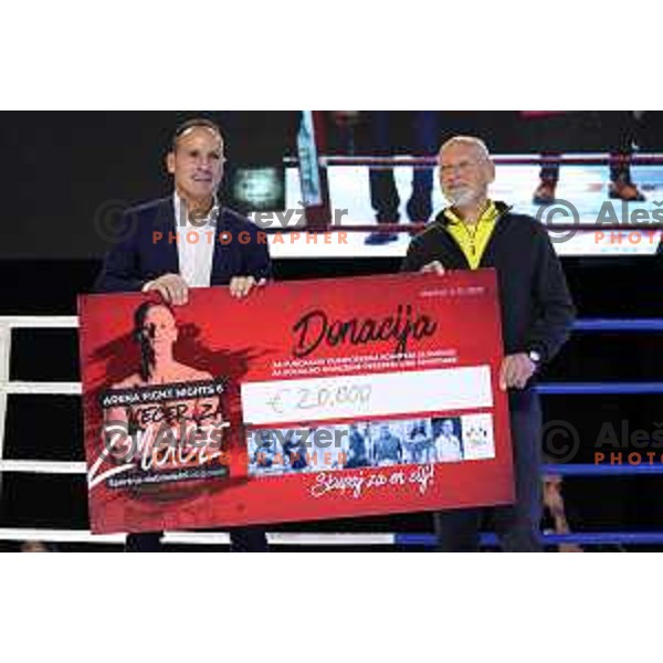 Tomaz Barada and Miro Cerar with charity check ay Arena Fight Nights- Sport & Charity event in Maribor, Slovenia on December 2, 2022 