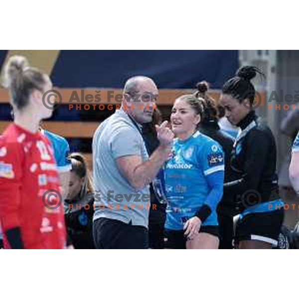 Dragan Adzic and Jovanka Radicevic in action during EHF Champions league Women handball match between Krim Mercator (SLO) and Odense (DEN) in Ljubljana, Slovenia on December 4, 2022 