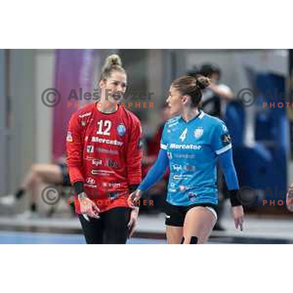 Barbara Arenhart and Jovanka Radicevic in action during EHF Champions league Women handball match between Krim Mercator (SLO) and Odense (DEN) in Ljubljana, Slovenia on December 4, 2022 