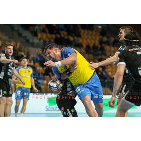Matic Suholeznik in action during EHF Champions League handball match between Celje Pivovarna Lasko and Elverum handball in Zlatorog Arena, Celje, Slovenia on December 7, 2022