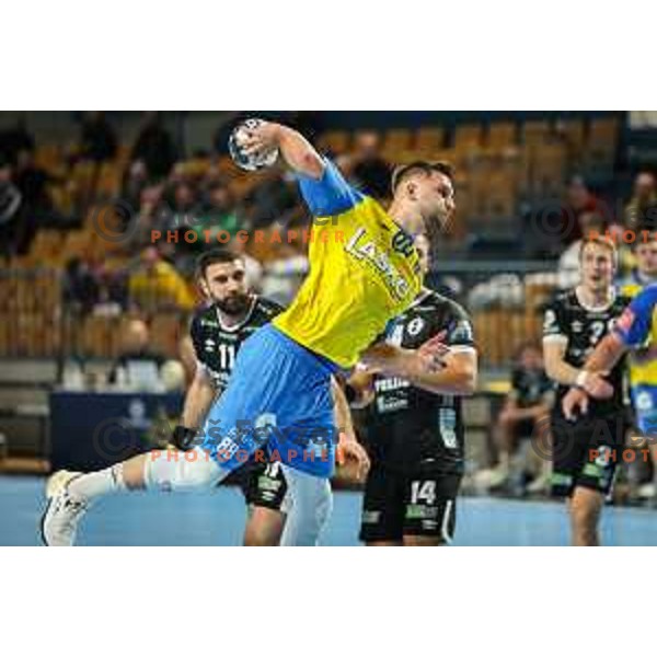 Aleks Vlah in action during EHF Champions League handball match between Celje Pivovarna Lasko and Elverum handball in Zlatorog Arena, Celje, Slovenia on December 7, 2022