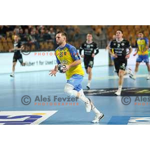 Aleks Vlah in action during EHF Champions League handball match between Celje Pivovarna Lasko and Elverum handball in Zlatorog Arena, Celje, Slovenia on December 7, 2022