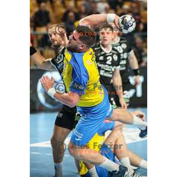 Matic Suholeznik in action during EHF Champions League handball match between Celje Pivovarna Lasko and Elverum handball in Zlatorog Arena, Celje, Slovenia on December 7, 2022