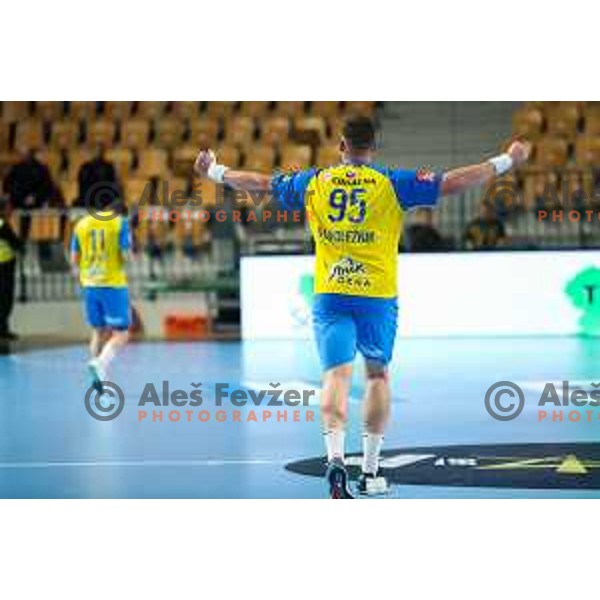 Matic Suholeznik in action during EHF Champions League handball match between Celje Pivovarna Lasko and Elverum handball in Zlatorog Arena, Celje, Slovenia on December 7, 2022