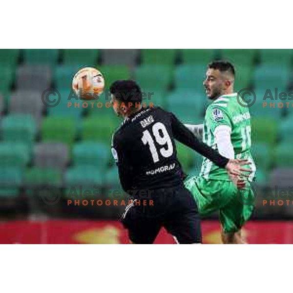 Mirlind Daku and Djordje Crnomarkovic in action during Prva Liga Telemach 2022-2023 football match between Olimpija and Mura in SRC Stozice, Ljubljana, Slovenia on December 8, 2022