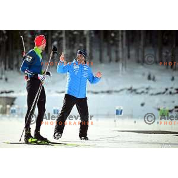 Jakov Fak and head caoch Ricco Gros of Slovenia Biathlon team during practice session at Pokljuka, Slovenia on December 22, 2022 
