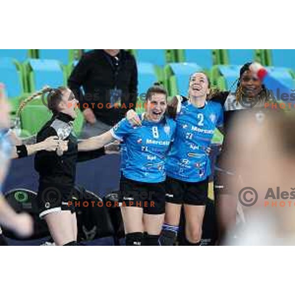 Sanja Radosavjevic, Ema Abina and Betchaidelle Ngombele of Krim Mercator celebrate victory at EHF Champions league Women 2022-2023 handball match between Krim Mercator (SLO) and CSM Bucuresti (ROU) in Ljubljana, Slovenia on February 12, 2023