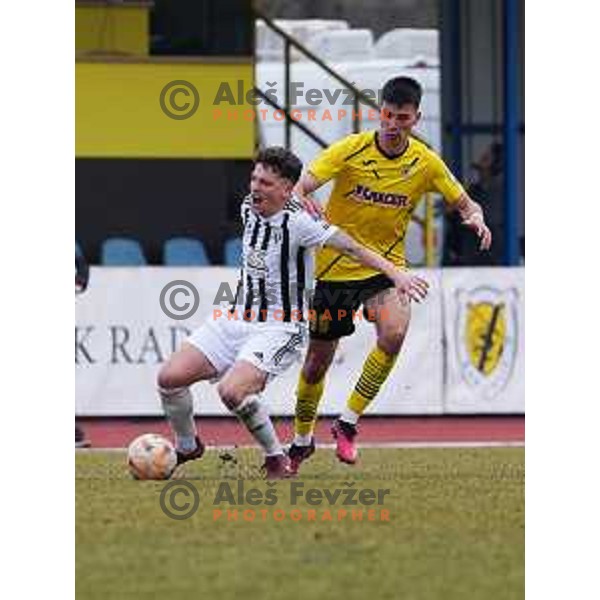 Kai Cipot of Mura and Filip Cuic of Kalcer Radomlje during Prva Liga Telemach 2022-2023 football match between Kalcer Radomlje and Mura in Sportni park Domzale, Domzale, Slovenia on February 18, 2023