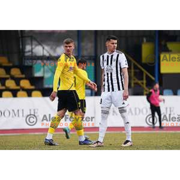 Anel Zulic of Kalcer Radomlje and Mirlind Daku of Mura during Prva Liga Telemach 2022-2023 football match between Kalcer Radomlje and Mura in Sportni park Domzale, Domzale, Slovenia on February 18, 2023