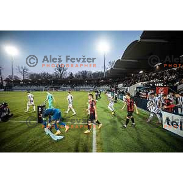 Players of Tabor Sezana and Mura entering pitch during Prva liga Telemach football match between Mura and Tabor Sezana in Fazanerija, Murska Sobota, Slovenia on February 21, 2023. Photo: Jure Banfi
