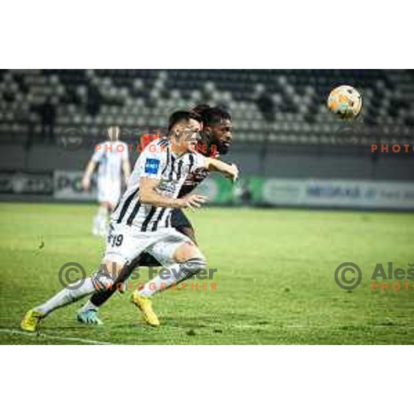 Mirlind Daku vs Thaddee Oded Kaleba in action during Prva liga Telemach football match between Mura and Tabor Sezana in Fazanerija, Murska Sobota, Slovenia on February 21, 2023. Photo: Jure Banfi