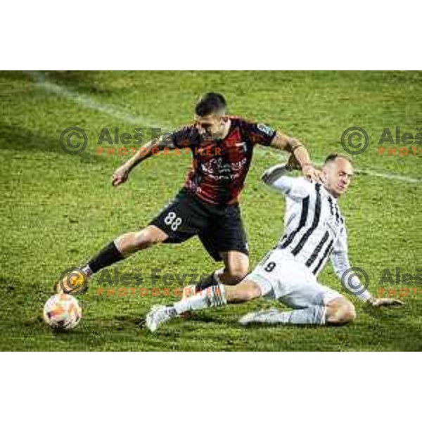 Alen Korošec vs Matic Marusko in action during Prva liga Telemach football match between Mura and Tabor Sezana in Fazanerija, Murska Sobota, Slovenia on February 21, 2023. Photo: Jure Banfi