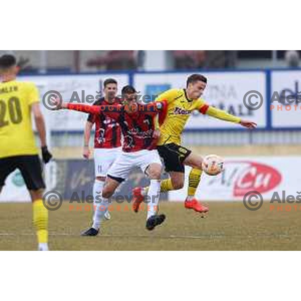 Adrian Zeljkovic of Tabor Sezana and Sandi Nuhanovic of Kalcer Radomlje during Prva Liga Telemach 2022-2023 football match between Kalcer Radomlje and Tabor Sezana in Sportni park Domzale, Domzale, Slovenia on February 25, 2023