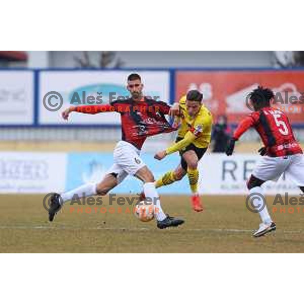Adrian Zeljkovic of Tabor Sezana and Sandi Nuhanovic of Kalcer Radomlje during Prva Liga Telemach 2022-2023 football match between Kalcer Radomlje and Tabor Sezana in Sportni park Domzale, Domzale, Slovenia on February 25, 2023