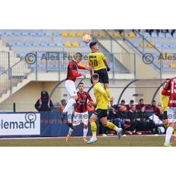 Adrian Zeljkovic of Tabor Sezana and Ester Sokler of Kalcer Radomlje during Prva Liga Telemach 2022-2023 football match between Kalcer Radomlje and Tabor Sezana in Sportni park Domzale, Domzale, Slovenia on February 25, 2023