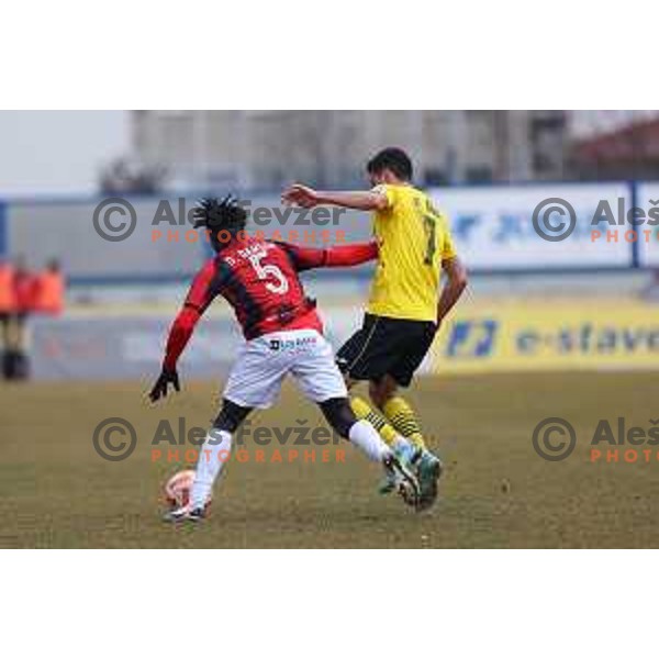 Kouao Christ Damsen Denis of Tabor Sezana and Marko Cuic of Kalcer Radomlje during Prva Liga Telemach 2022-2023 football match between Kalcer Radomlje and Tabor Sezana in Sportni park Domzale, Domzale, Slovenia on February 25, 2023