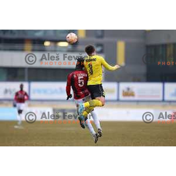 Kouao Christ Damsen Denis of Tabor Sezana and Stipo Markovic of Kalcer Radomlje during Prva Liga Telemach 2022-2023 football match between Kalcer Radomlje and Tabor Sezana in Sportni park Domzale, Domzale, Slovenia on February 25, 2023