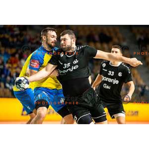 Gal Marguc and Branko Predovic in action during 1.NLB league handball match between Celje Pivovarna Lasko and Gorenje Velenje in Arena Zlatorog, Celje, Slovenia on February 26, 2023