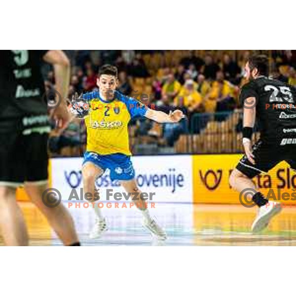 Tilen Strmljan in action during 1.NLB league handball match between Celje Pivovarna Lasko and Gorenje Velenje in Arena Zlatorog, Celje, Slovenia on February 26, 2023