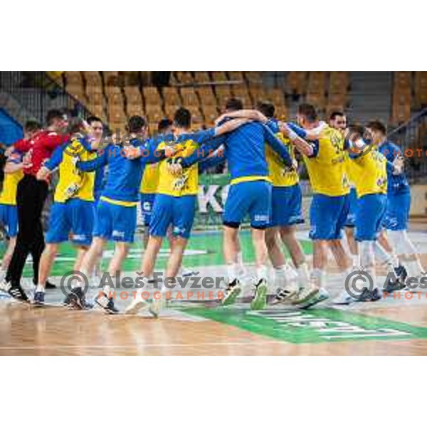 players of Celje celebrate victory at 1.NLB league handball match between Celje Pivovarna Lasko and Gorenje Velenje in Arena Zlatorog, Celje, Slovenia on February 26, 2023