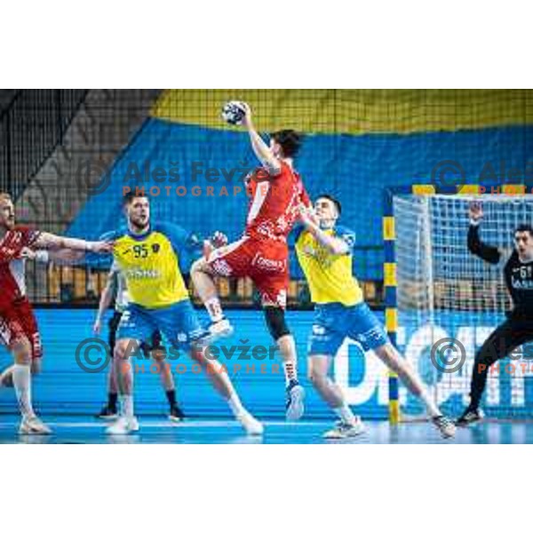 Matic Suholeznik and Ante Ivankovic in action during EHF Champions League handball match between Celje PL and Aalborg in Dvorana Zlatorog, Celje, Slovenia on March 1, 2023. Photo: Jure Banfi