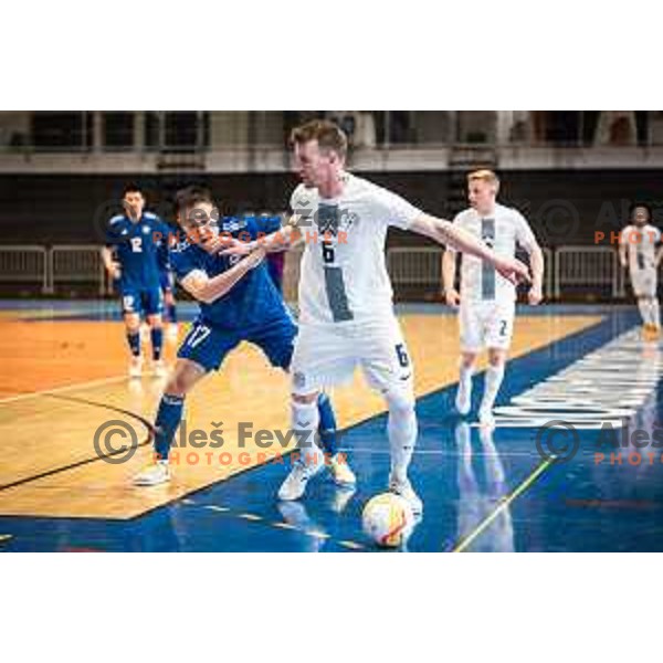 Birzhan Orazov vs Denis Totoskovic in action during Futsal World Cup 2024 qualification match between Slovenia and Kazakhstan in Dvorana Tabor, Maribor, Slovenia on March 8, 2023. Photo: Jure Banfi