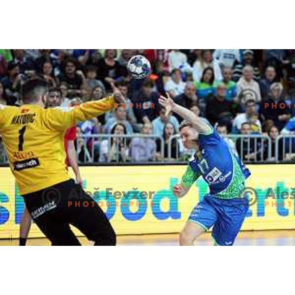 Domen Novak in action during Men\'s Euro 2024 Qualifiers handball match between Slovenia and Montenegro in Koper, Slovenia on March 12, 2023