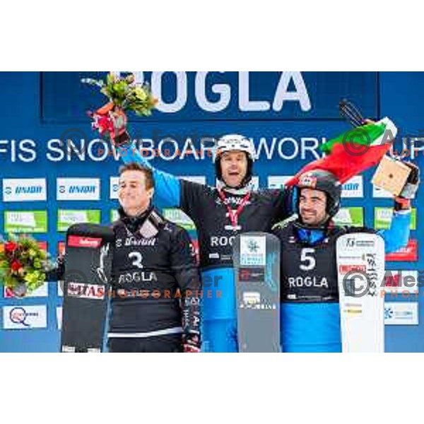 Mirko Felicetti, Roland Fischnaller, winner of FIS Snowboard World Cup Parallel Giant Slalom and Coratti at Rogla Ski resort, Slovenia on March 15, 2023