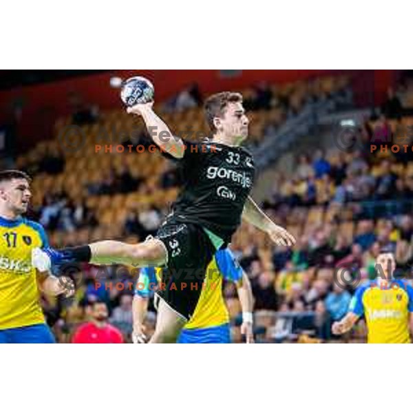 Enej Slatinek Jovicic in action during Slovenian cup handball match between Celje Pivovarna Lasko and Gorenje Velenje in Arena Zlatorog, Celje, Slovenia on March 15, 2023