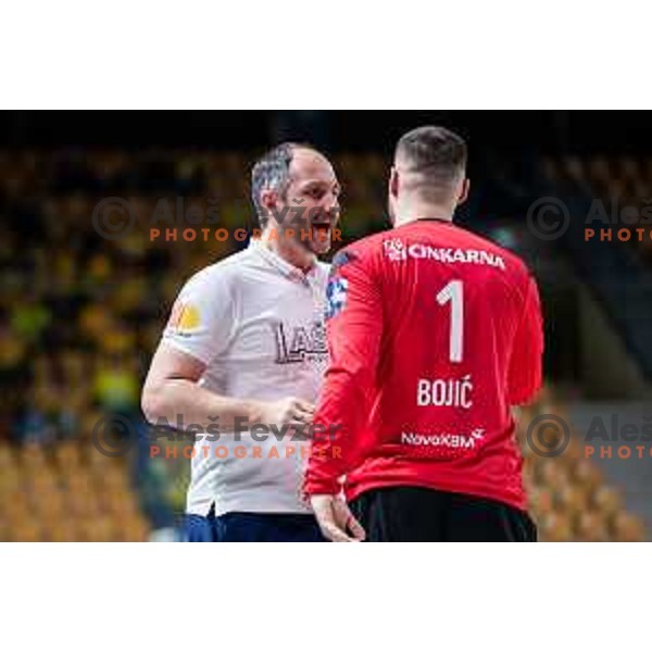 Alem Toskic and Nebojsa Bojic in action during Slovenian cup handball match between Celje Pivovarna Lasko and Gorenje Velenje in Arena Zlatorog, Celje, Slovenia on March 15, 2023