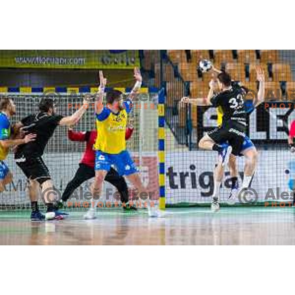 in action during Slovenian cup handball match between Celje Pivovarna Lasko and Gorenje Velenje in Arena Zlatorog, Celje, Slovenia on March 15, 2023