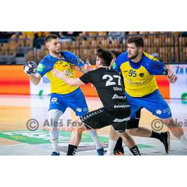 Aleks Vlah and Matic Suholeznik in action during Slovenian cup handball match between Celje Pivovarna Lasko and Gorenje Velenje in Arena Zlatorog, Celje, Slovenia on March 15, 2023
