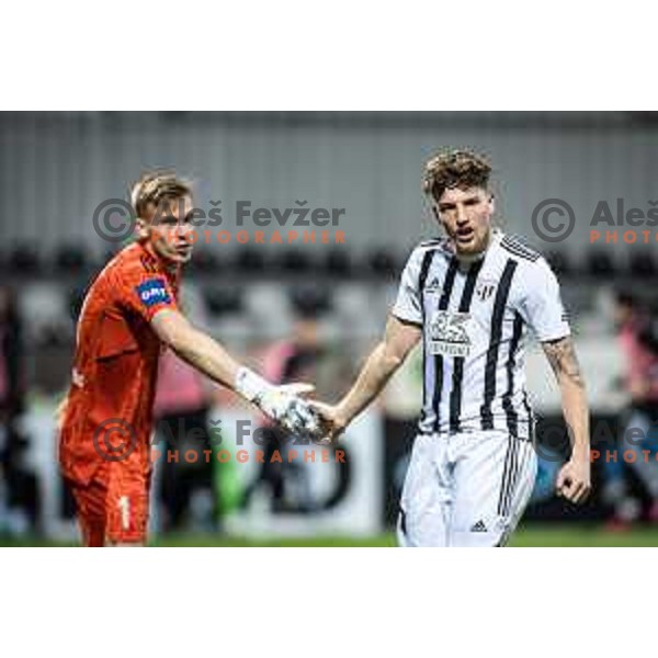 Klemen Mihelak and Kai Cipot in action during Prva liga Telemach football match between Mura and Koper in Fazanerija, Murska Sobota, Slovenia on March 16, 2023. Photo: Jure Banfi
