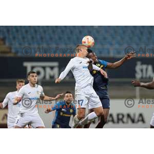 Nermin Hodzic and Charles Ikwuemesi in action during Prva Liga Telemach 2022-2023 football match between Celje and Domzale in Celje, Slovenia on March 18, 2023