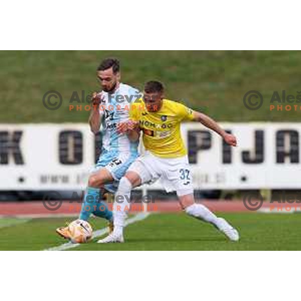 Darko Hrka and David Flakus Bosilj in action during Prva Liga Telemach 2022-2023 football match between Bravo and Gorica in Ljubljana, Slovenia on March 19, 2023