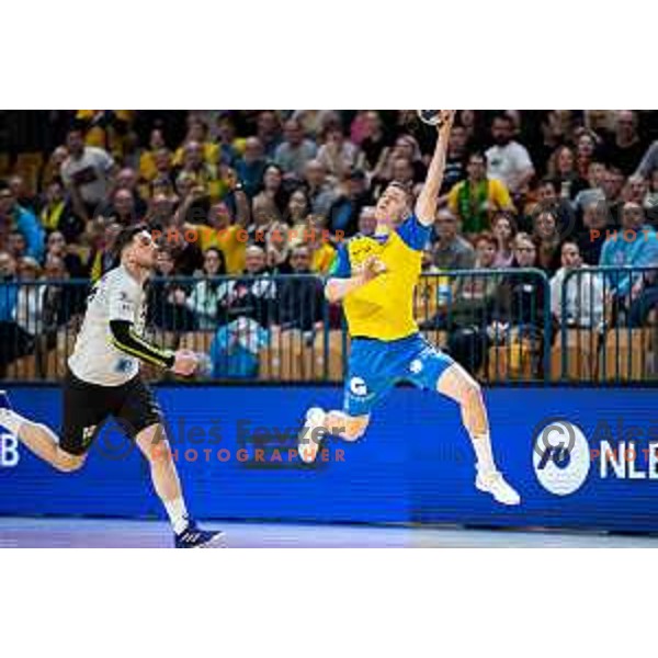Tadej Mazej in action during 1.NLB league handball match between Celje Pivovarna Lasko and Trimo Trebnje in Celje, Slovenia on March 31, 2023.
