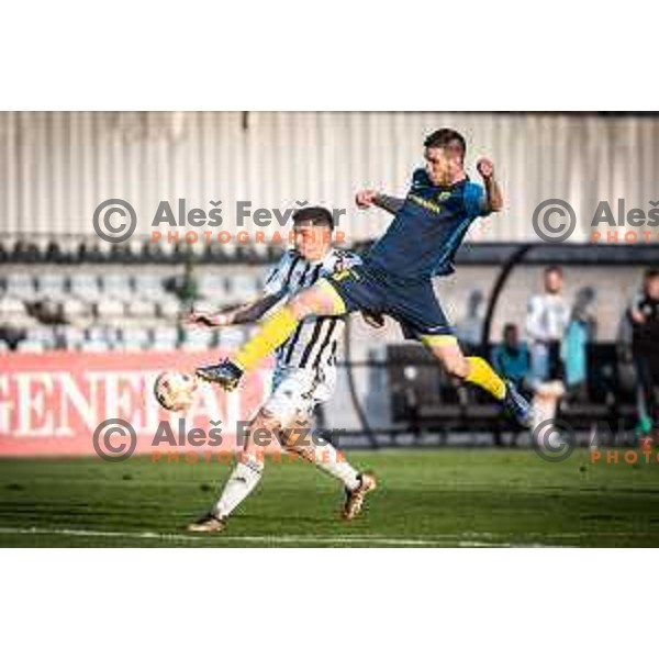 Mirlind Daku vs Damjan Vuklisevic in action during Prva liga Telemach football match between Mura and Celje in Fazanerija, Murska Sobota, Slovenia on April 10, 2023. Photo: Jure Banfi