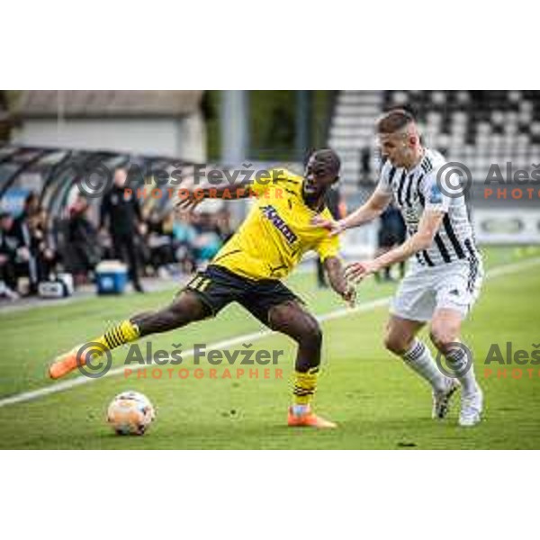 Darly Nlandu Lufuilu vs Amar Beganovic in action during Prva liga Telemach football match between Mura and Radomlje in Fazanerija, Murska Sobota, Slovenia on April 15, 2023. Photo: Jure Banfi