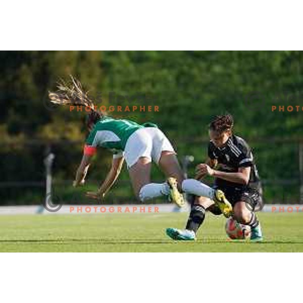 in action during Women\'s First league football match between ZNK Olimpija and ZNK Mura Nona in Ljubljana, Slovenia on April 22, 2023