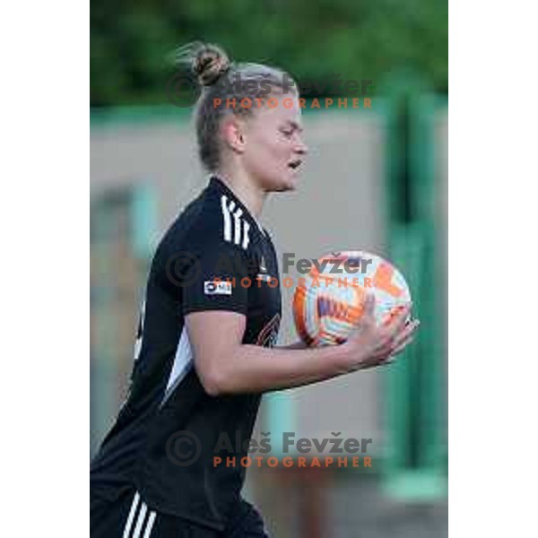 in action during Women\'s First league football match between ZNK Olimpija and ZNK Mura Nona in Ljubljana, Slovenia on April 22, 2023