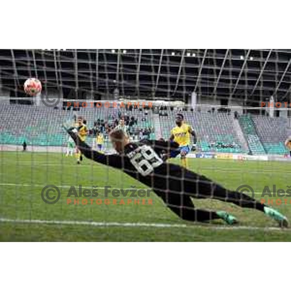 Bright Edomwonyi scores a goal from a penalty kick past Matevz Vidovsek during Prva Liga Telemach 2022-2023 football match between Olimpija and Koper in SRC Stozice, Ljubljana, Slovenia on April 30, 2023