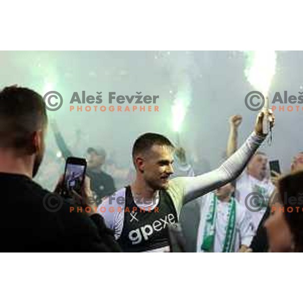 Timi Max Elsnik and fans of Olimpija celebrate victory at Pivovarna Union Slovenian Cup match between Olimpija and Maribor in Celje on May 6, 2023