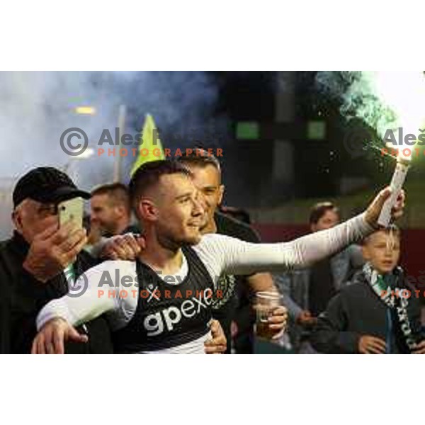 Timi Max Elsnik and fans of Olimpija celebrate victory at Pivovarna Union Slovenian Cup match between Olimpija and Maribor in Celje on May 6, 2023