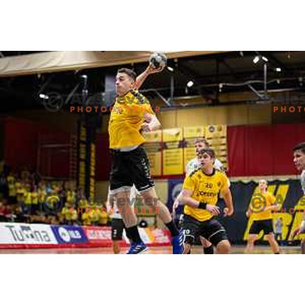 Enej Jovicic Slatinek in action during 1.NLB league handball match between Gorenje Velenje and Trimo Trebnje in Velenje, Slovenia on May 14, 2023